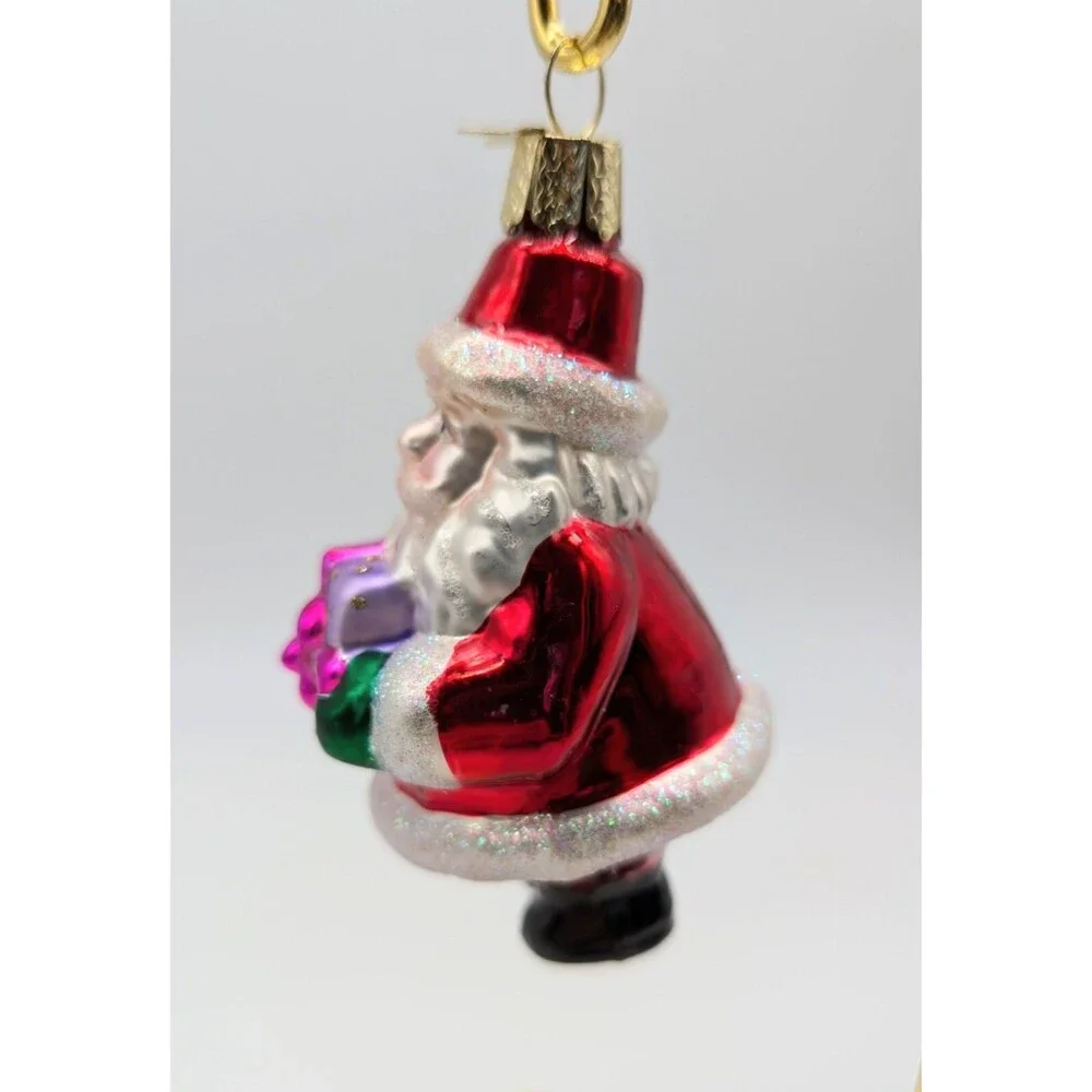 OLD WORLD CHRISTMAS Blown Glass Santa Claus Holding Gift Ornament 4